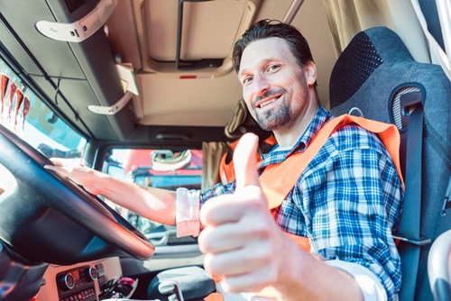 image of a truck driver with thumbs up