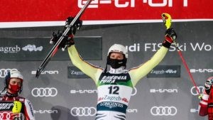 Linus Strasser is holding skiis after winning FIS Ski World Cup Zagreb 2021